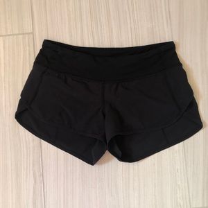 Lululemon speed up solid black shorts. Size 4